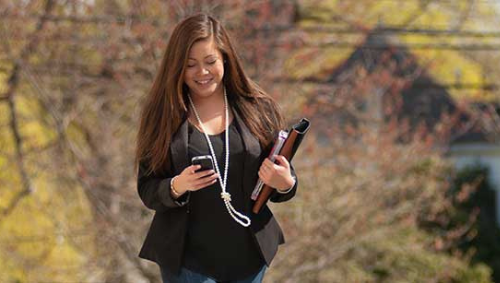 student walking on campus 
